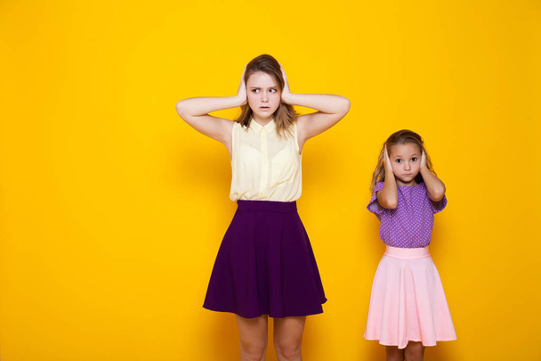 two girls close their ears - Photo, Image