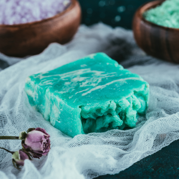 close up of natural green soap for spa on gauze - Foto, afbeelding
