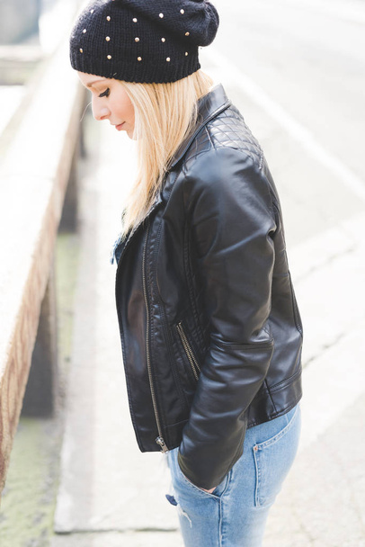 young woman beautiful blonde hair outdoor looking away, - Фото, изображение