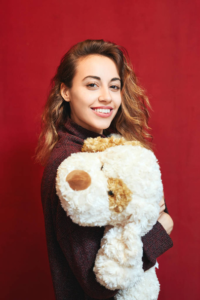 happy beautiful woman with a toy dog - Photo, image