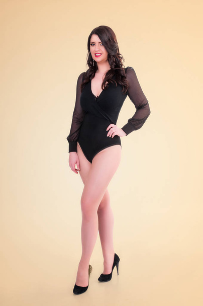Sexy beautiful brunette woman posing in elegant lingerie over ye - Foto, Bild