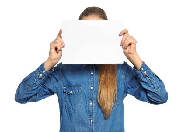 Young woman with blank sheet of paper for advertising on white background - Foto, Bild