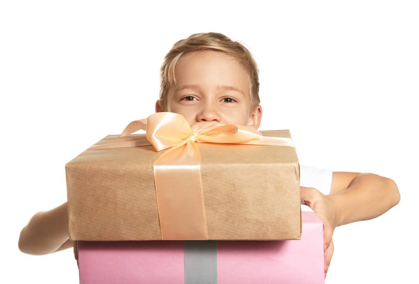 Cute little boy with gifts for Mother's Day on white background - 写真・画像