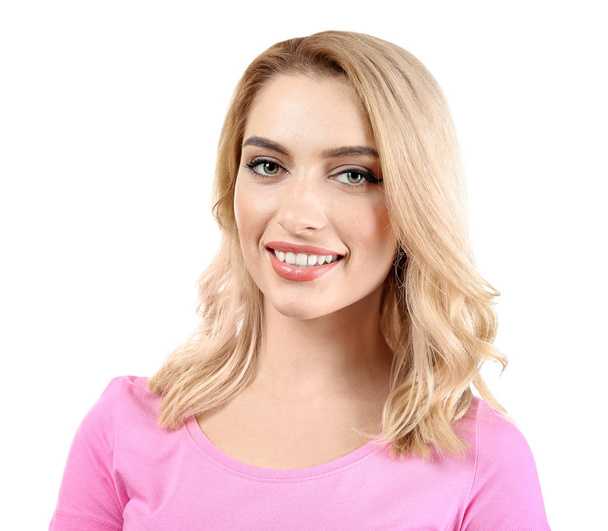 Young beautiful smiling woman on white background - Фото, зображення