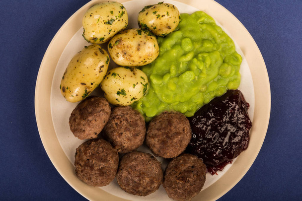 Norwegian or Swedish Meatballs With Mushy Peas Boiled Potatoes  - Photo, Image