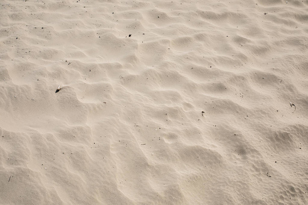 textura de praia de areia marrom natural
  - Foto, Imagem