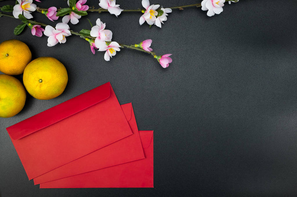 Flat lay holiday of Chinese new year red packet and of accessori - Photo, Image