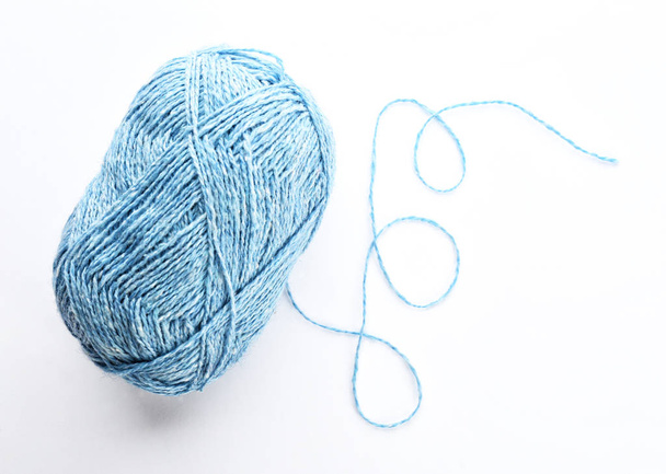 Blue yarn bundle on white background - Foto, Bild