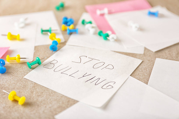 Note with text "Stop bullying" on table - Fotó, kép