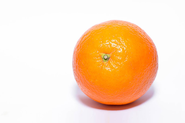 Orange on a white background - Φωτογραφία, εικόνα