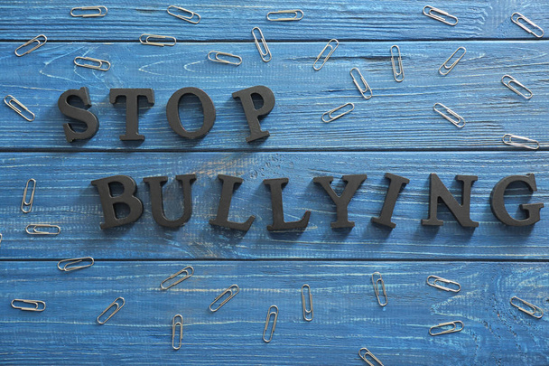 Text "Stop bullying" on wooden background - Zdjęcie, obraz