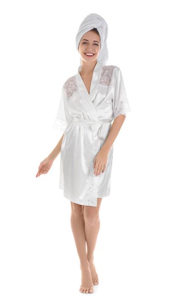 young woman in towel and silk robe  - Foto, imagen
