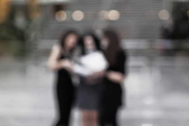 blurred image of business team standing in office - Foto, Imagen