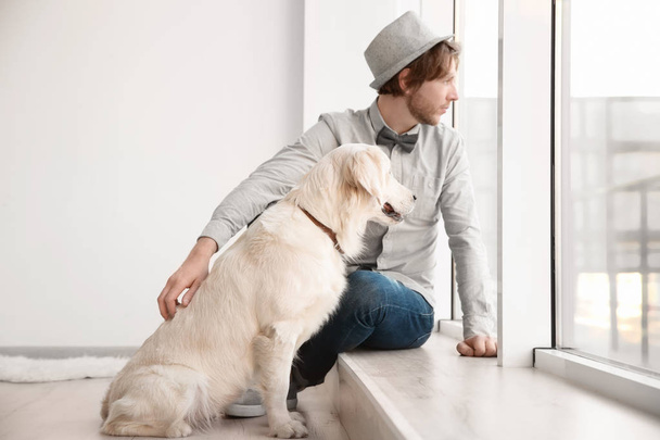 young hipster with dog  - Photo, Image