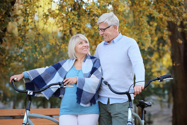 elderly couple with bicycles - Photo, image