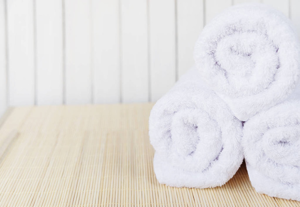 Three white fluffy bath towels - Foto, Imagem