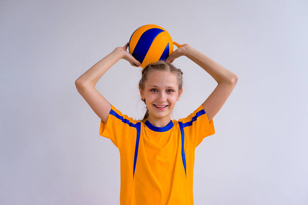 Girl playing volleyball - Фото, изображение