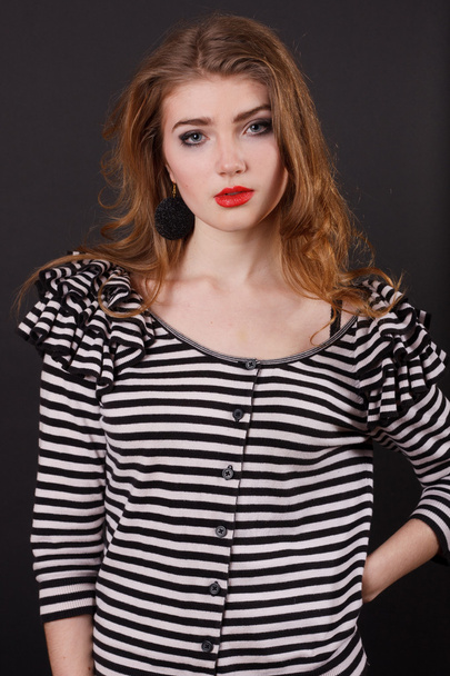 Beautiful young girl in a striped blouse - Fotoğraf, Görsel