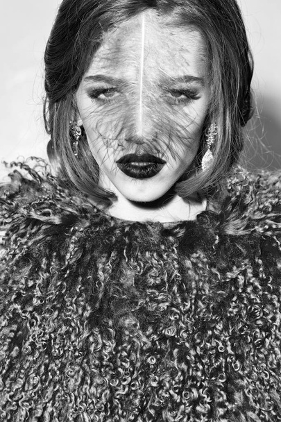 Tribal woman with feather closeup - Fotografie, Obrázek