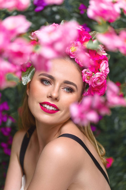 Beautiful woman with flowers wreath - Photo, Image