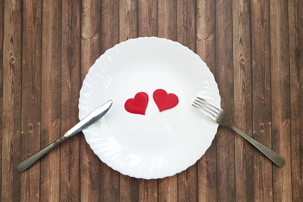 fork and knife plate white heart wooden - Valokuva, kuva