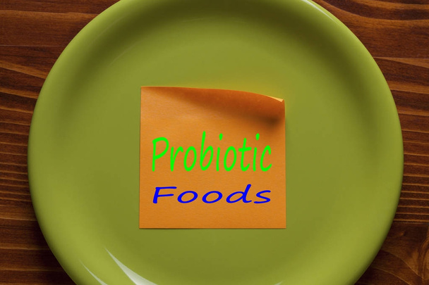 Τα προβιοτικά τρόφιμα γραμμένο σε μια σημείωση - Φωτογραφία, εικόνα