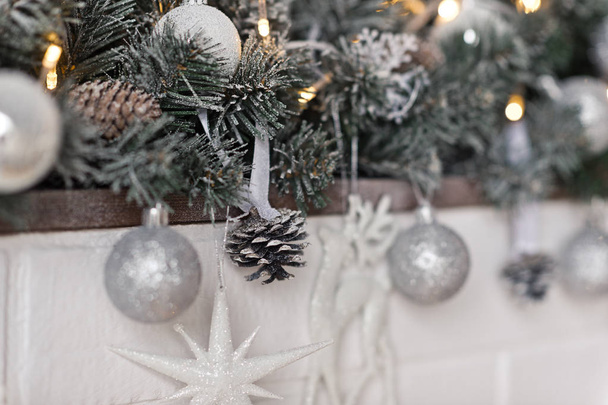 Elements of Christmas decorations and toys on the mantelpiece 93 - Foto, Bild