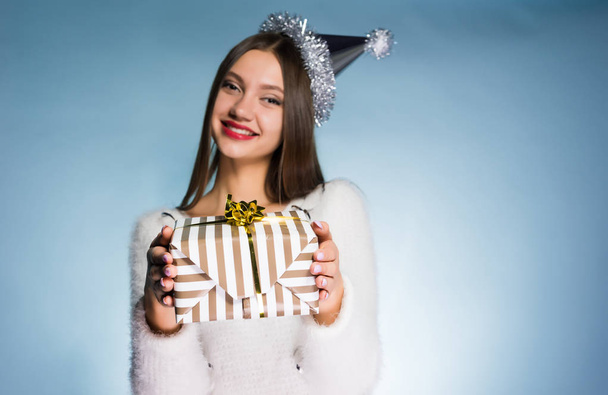 happy young girl received a gift for the new year - Zdjęcie, obraz