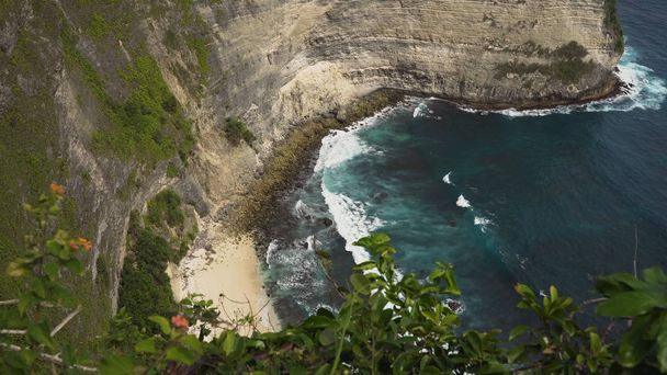 Cliffs, sea and waves at Nusa Penida, Bali, Indonesia - Photo, Image
