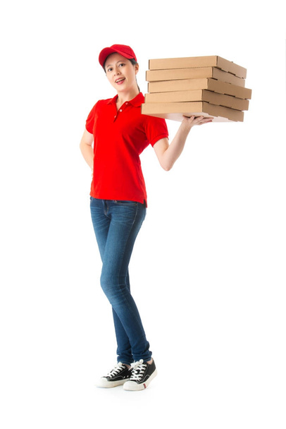 happy beautiful female pizza delivery worker - Photo, Image