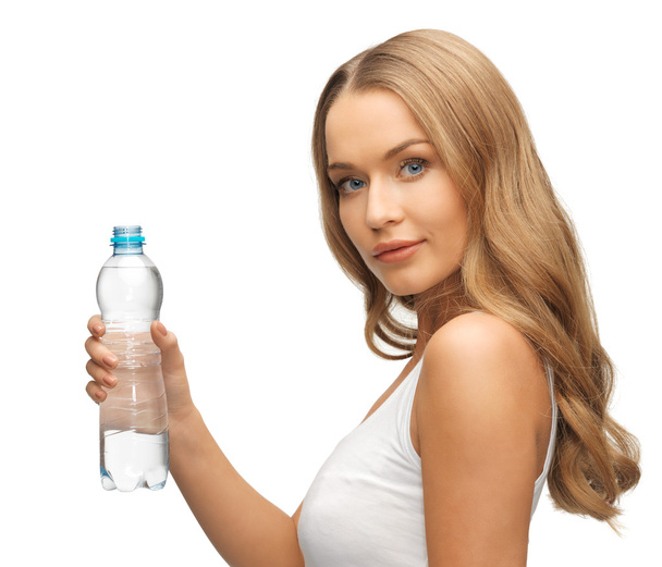 Young beautiful woman with bottle of water - Foto, afbeelding