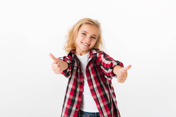 Portrait of a happy little girl standing - Foto, Imagem