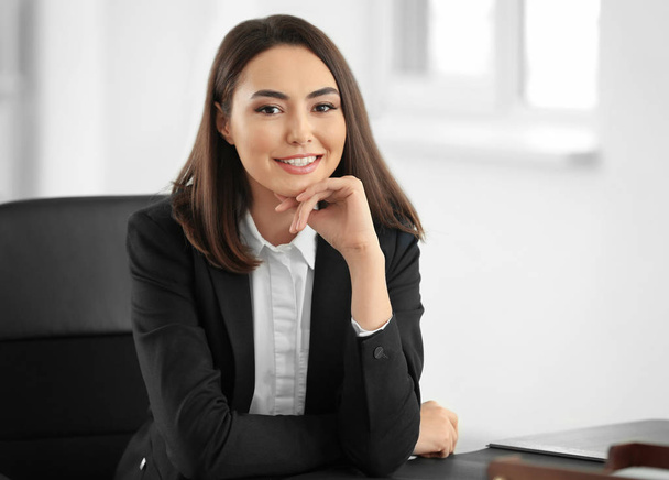 Attractive young lawyer in office - Фото, изображение