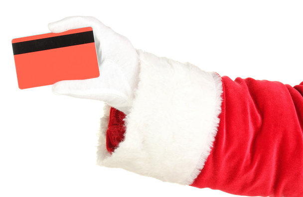 Santa Claus hand holding red credit card isolated on white - 写真・画像