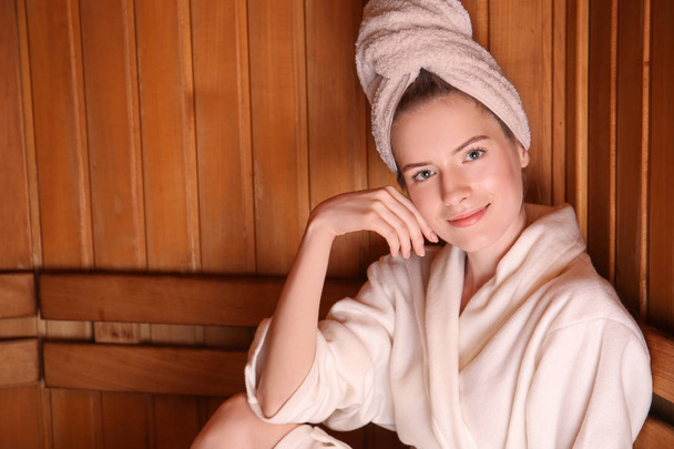 Beautiful young woman in sauna - Foto, Imagen