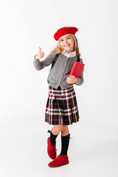 Full length portrait of a cheery little schoolgirl - Foto, Imagem