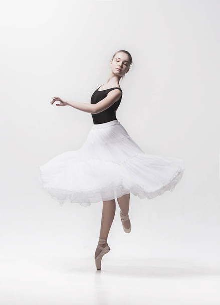 Young classical dancer isolated on white background. - Valokuva, kuva