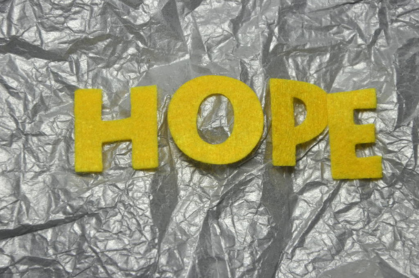 слово надежда на абстрактном цветном фоне
 - Фото, изображение