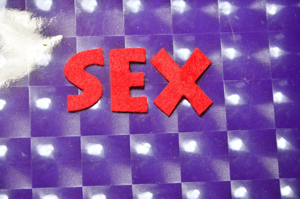 palavra sexo em um fundo colorido abstrato
 - Foto, Imagem