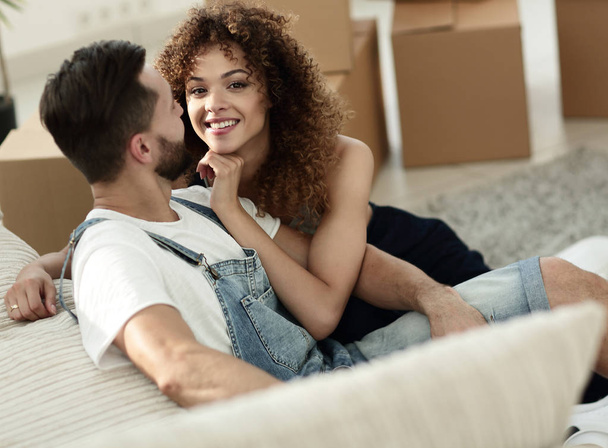 young couple in a new apartment. Concept of well-being - Φωτογραφία, εικόνα