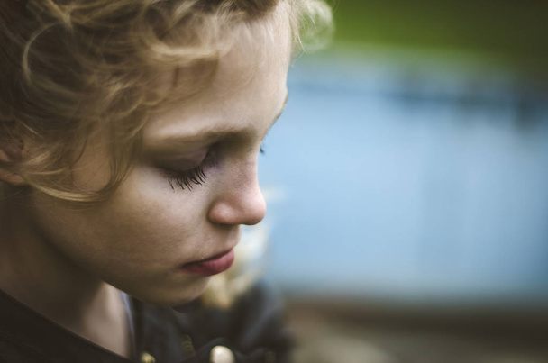 portrait of sad girl with closed eyes - Photo, Image