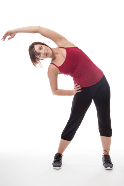 stretching before a workout down the gym - Фото, зображення