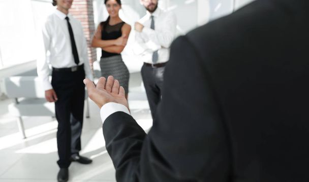 closeup. businessman holding out hand for a handshake. - Zdjęcie, obraz