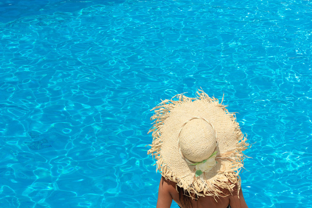 Woman at the swimming pool - Фото, изображение