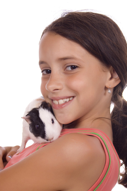 Young girl holding guinea pig - Fotoğraf, Görsel