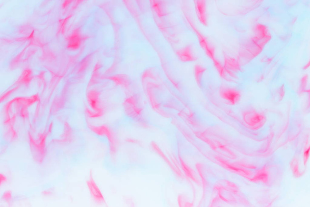 Pink blue abstract background on liquid, pink minimalistic background, pink blue pattern, pastel texture for designer, background preparation, colorful stains on milk, art - Photo, Image