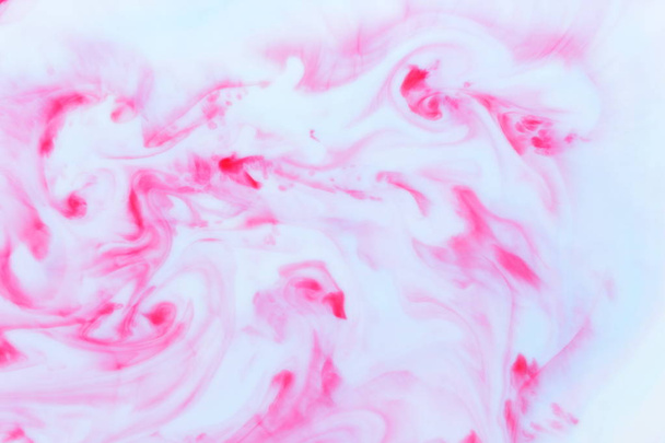 Pink blue abstract background on liquid, pink minimalistic background, pink blue pattern, pastel texture for designer, background preparation, colorful stains on milk, art - Fotografie, Obrázek