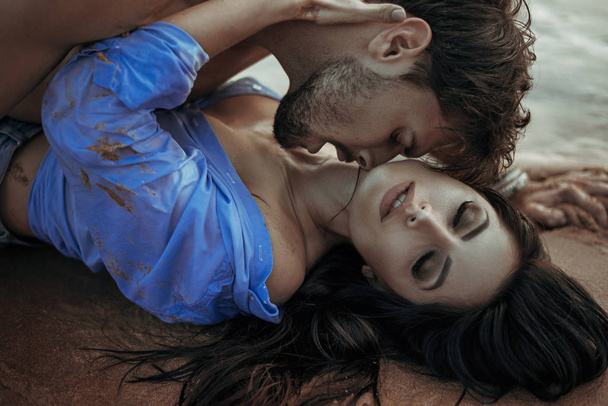 Handsome man kissing his sensual woman - Photo, Image