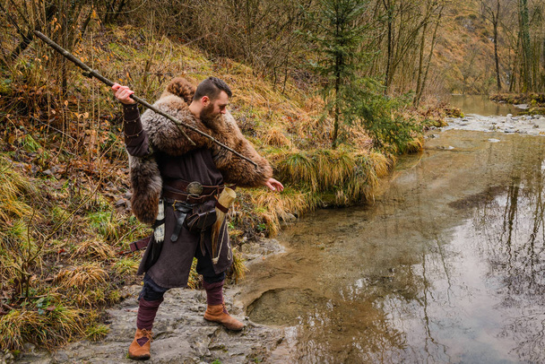 Viking fisherman on the river - Foto, immagini