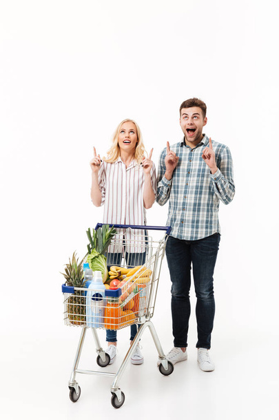 Full length portrait of a cheerful couple - Photo, Image
